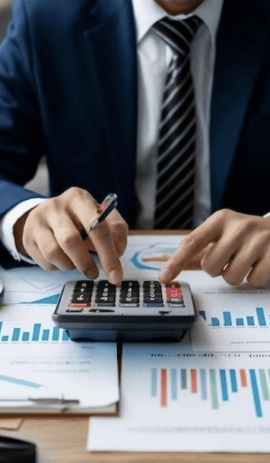 Analyst reviewing accounting evaluation data with a calculator